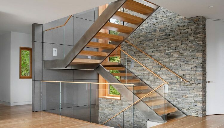 Stepping down on brown wooden stairs aerial